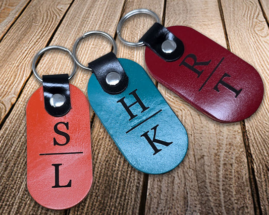 Engraved leather keychain with customized initials and multiple color options