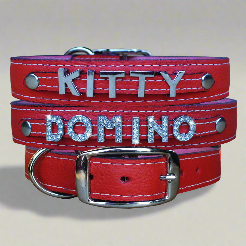 Red Leather dog collars featuring personalization with slide letters and charms, designed for large dog breeds.