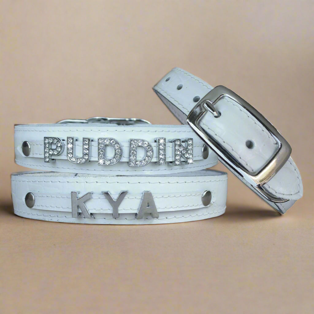 White leather dog collar personalized with shiny slide letters and the charms, designed for large size dog breeds.