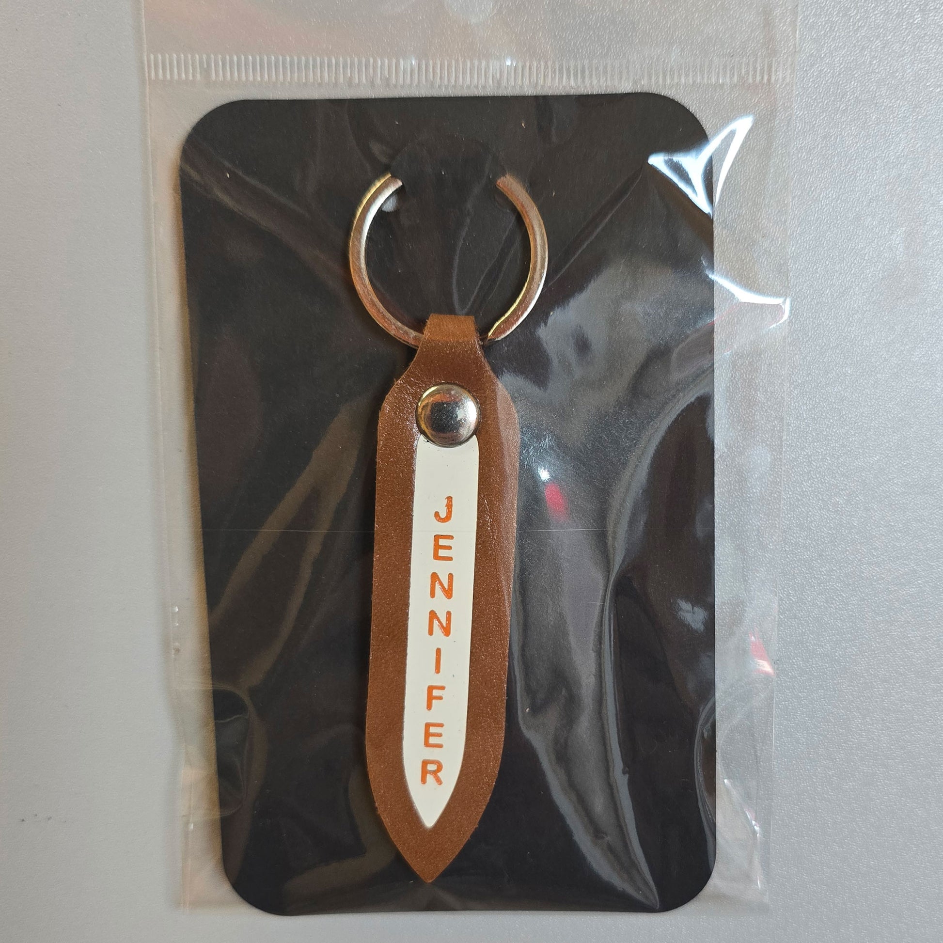 Engraved leather key fob in bright orange on with white insert - gift packed
